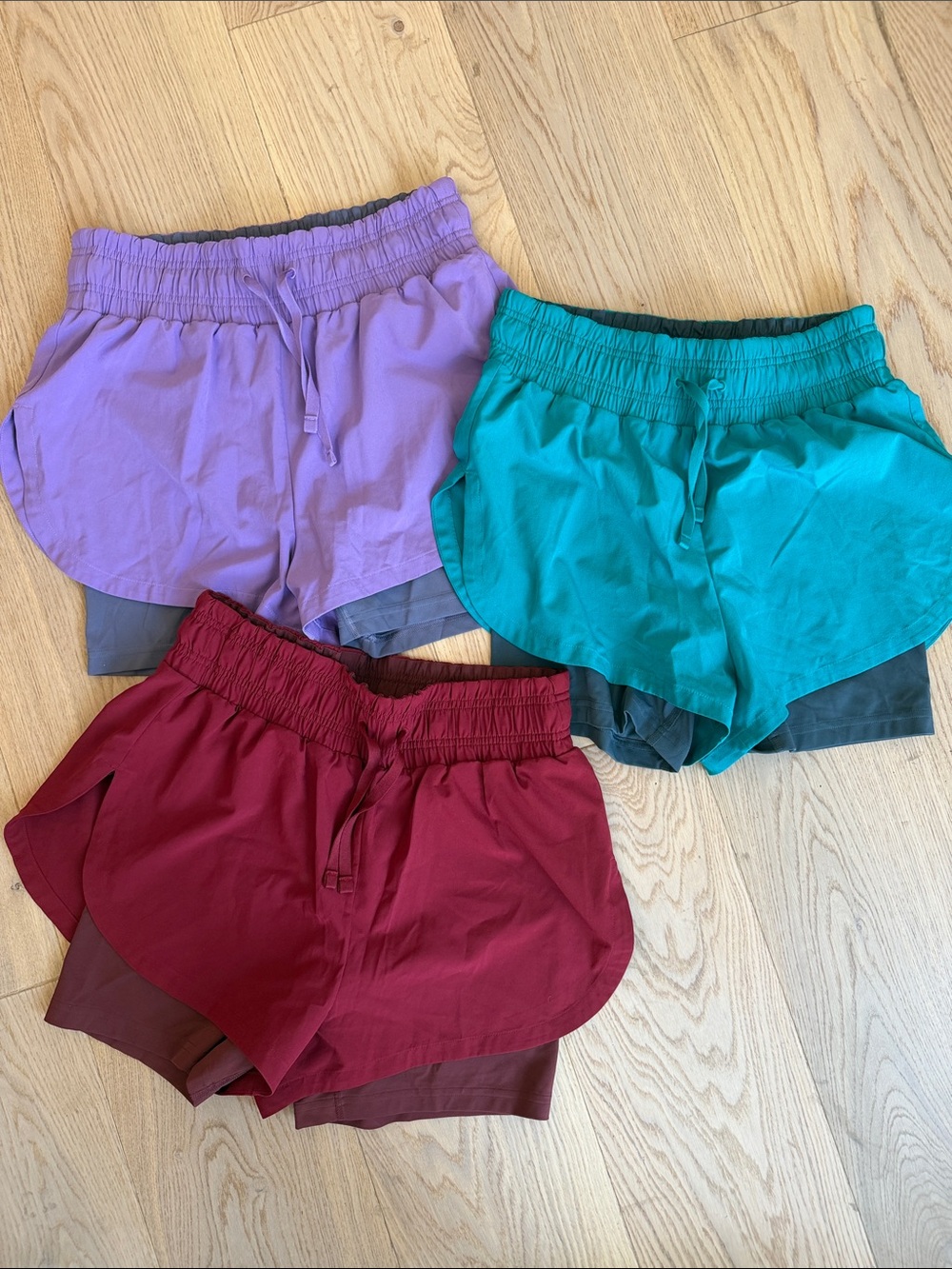 3-Pack Women's 2 in 1 Runner Shorts in Teal, Purple & Burgundy